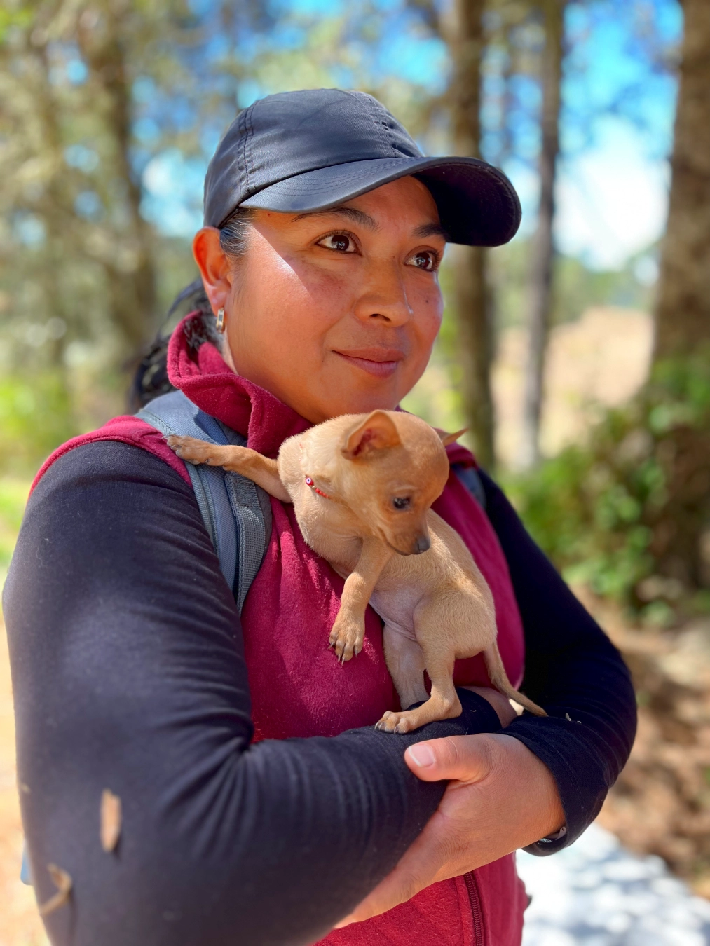 Ester and her dog in San Antonio Cuajimoloyas/Pueblos Mancomunados